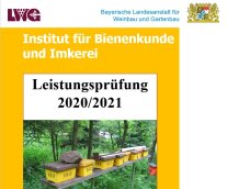 Titelbild des Berichtes der Leistungsprüfung 2021, abgebildet sind Begattungskästchen auf einem Bienenstand.